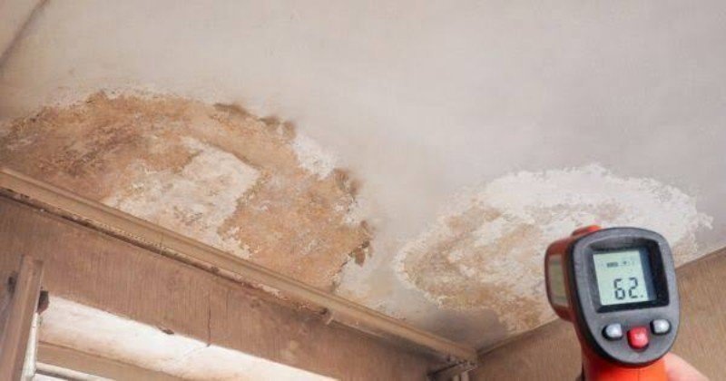 Technician assessing fire and smoke damage
